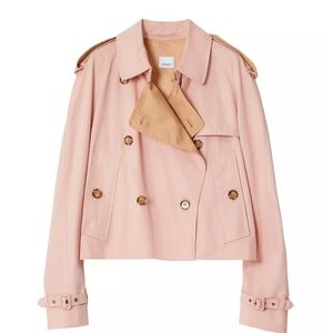 Pink Burberry cropped trench coat.